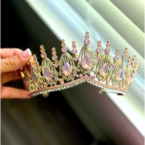 A pink opal crown. Never used. Perfect condition